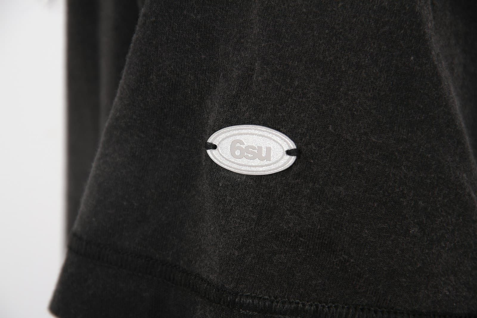 Brand logo tag stitched onto a garment